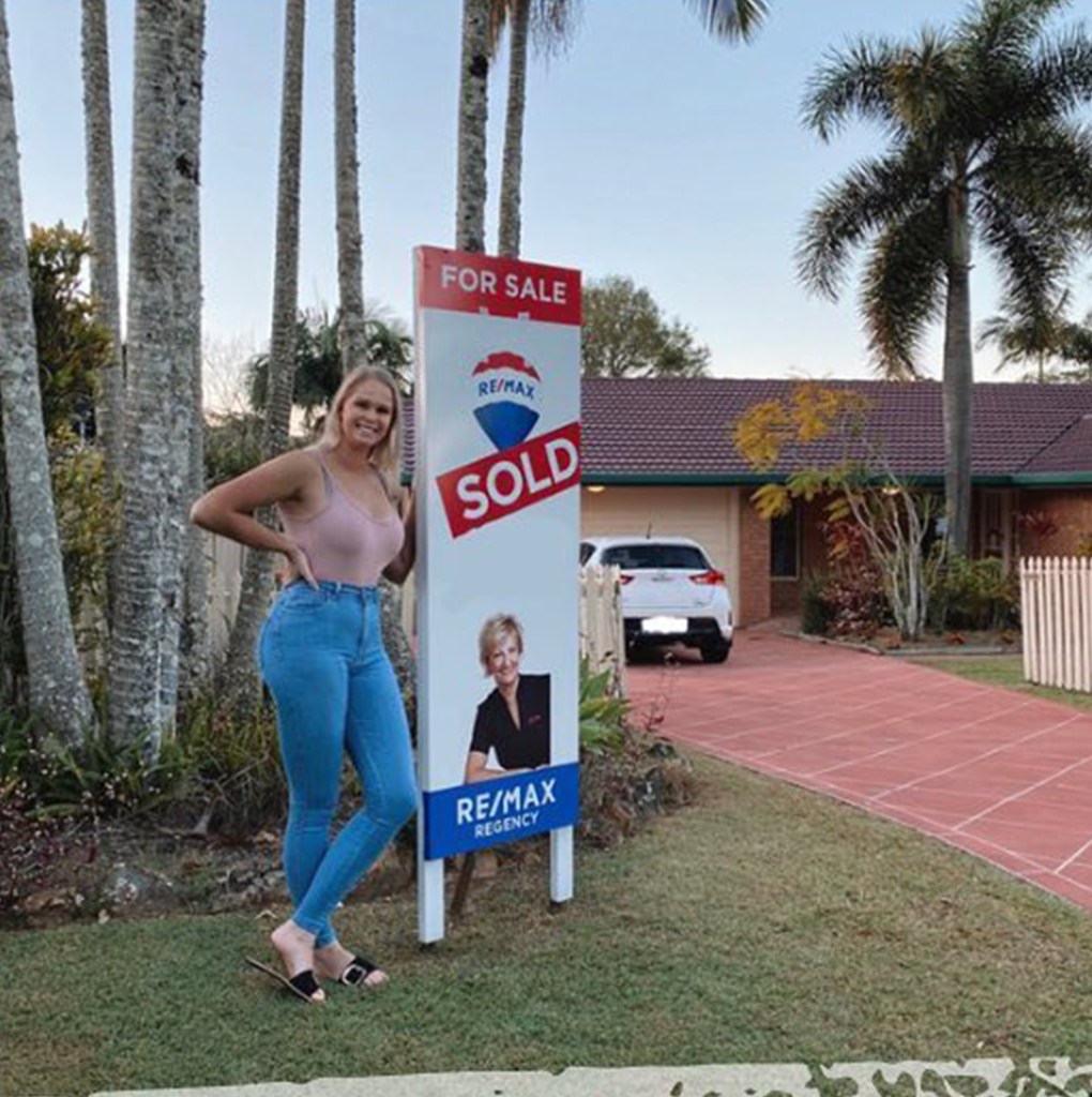 Maddie Walton is seen in front of her house.